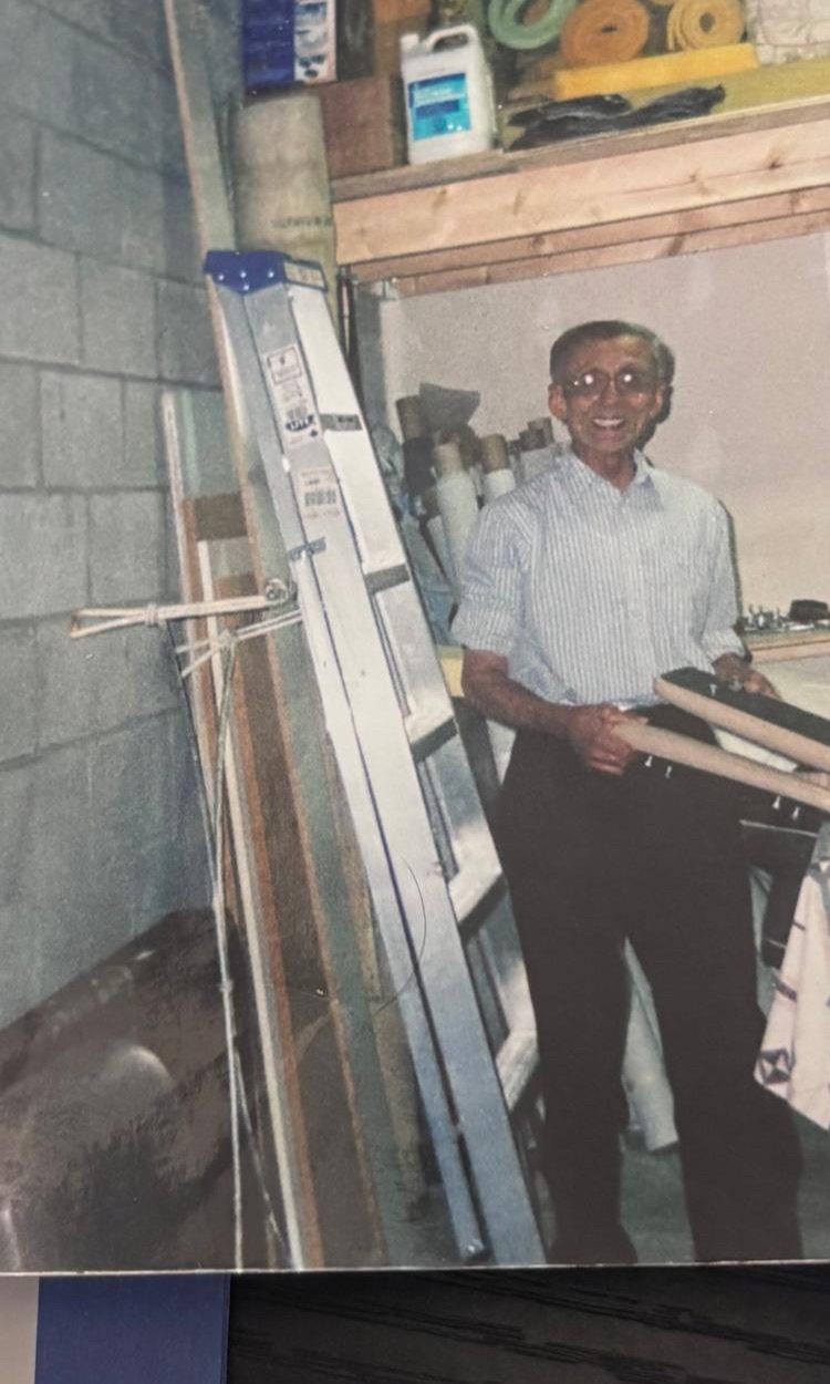 Hassan, co-founder of Nora’s Upholstery, in the original workshop